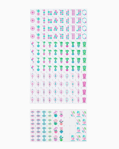 Sheet of colorful planner stickers with various designs on a white background