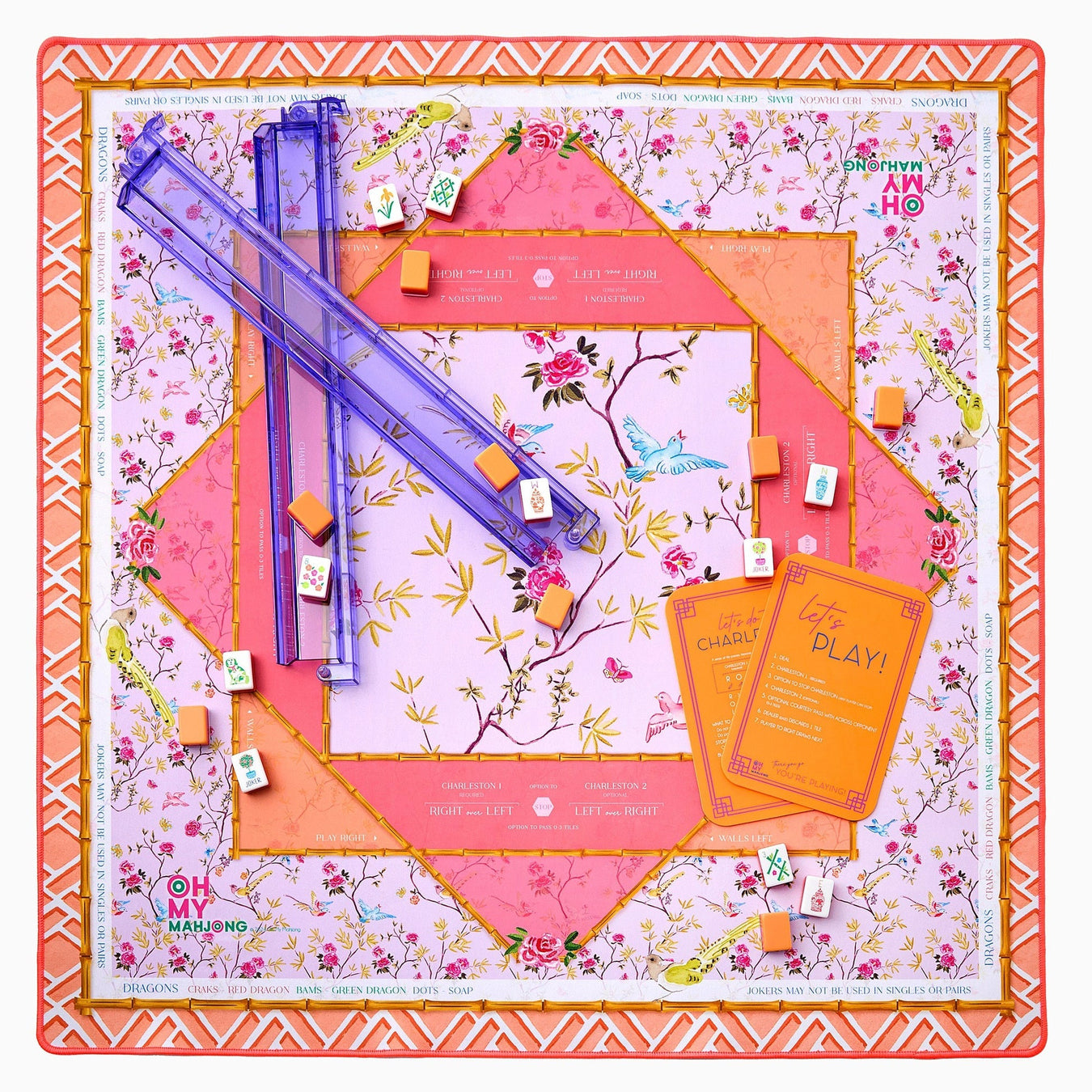 Floral-themed board game set with colorful components on a decorative board.