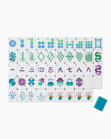 Set of Mahjong tiles with colorful designs on a white background