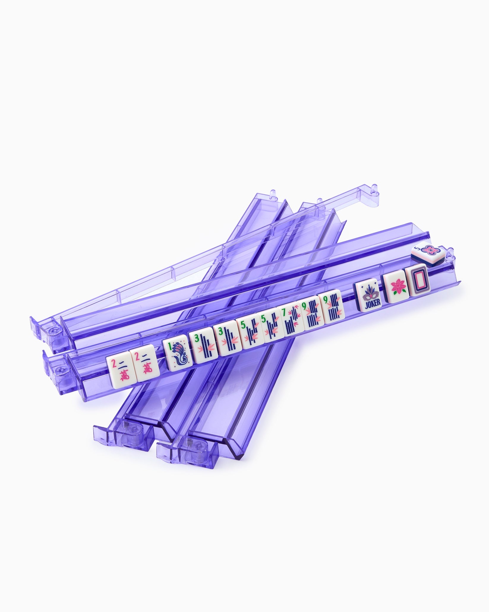 Stack of purple plastic straws with colorful labels on a white background