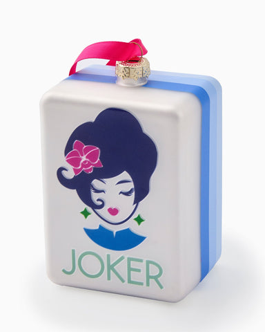 Decorative box with a cartoon character and 'JOKER' text on a white background