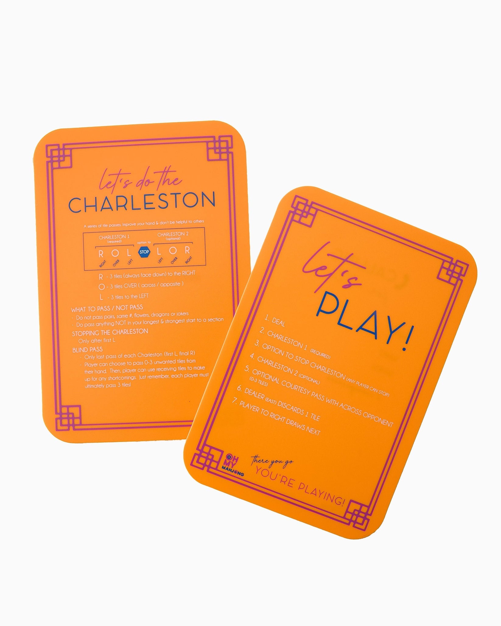 Two orange playing cards with text on a white background