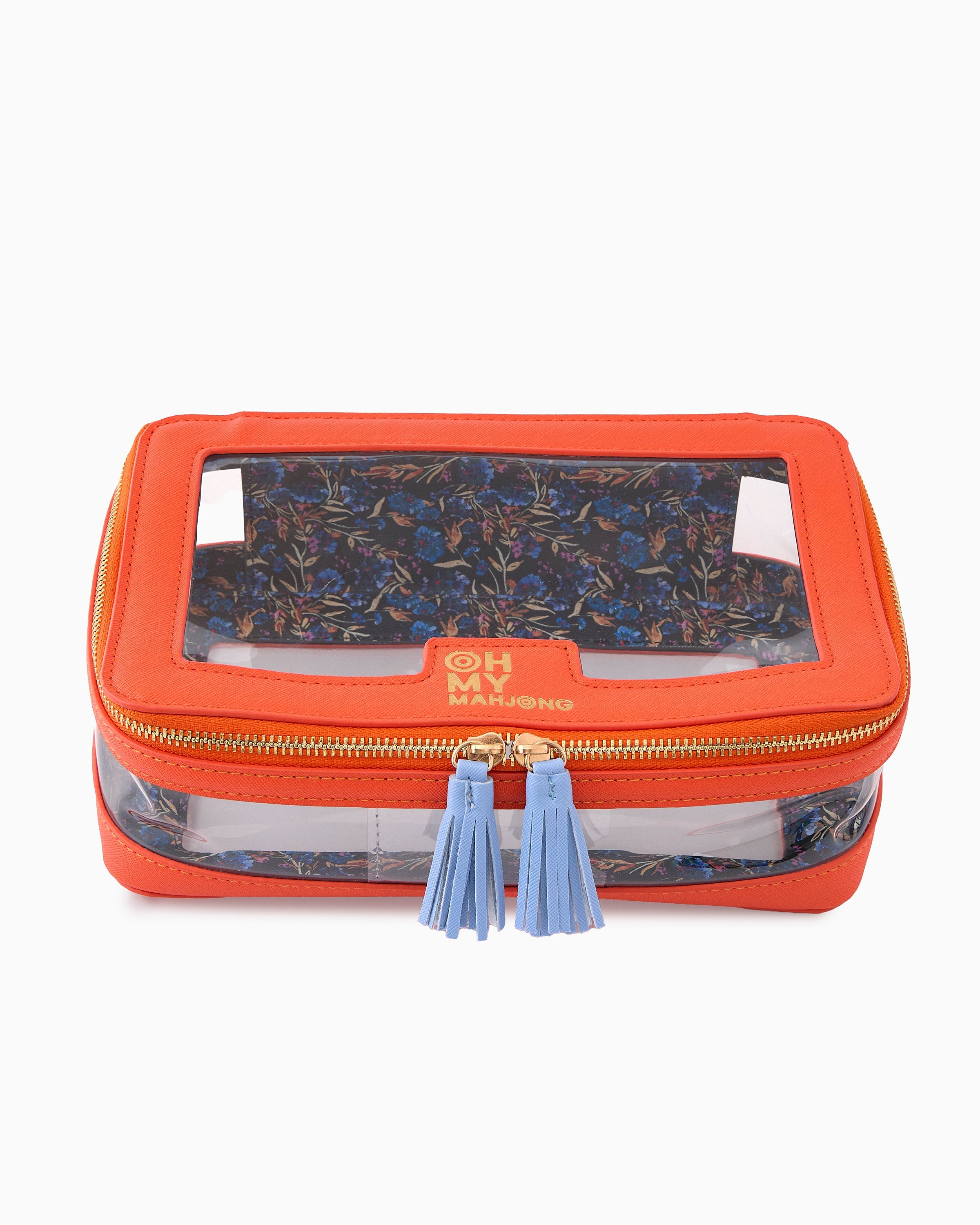 Orange travel pouch with clear front panel and blue tassel on a white background