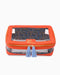 Orange travel pouch with clear front panel and blue tassel on a white background
