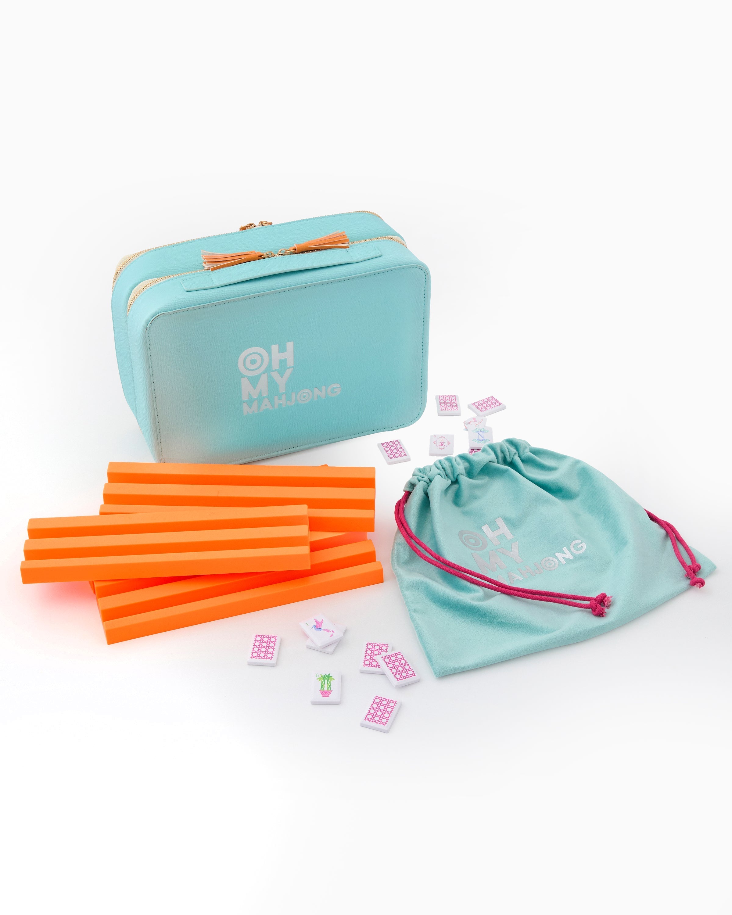 Teal box with orange straws and pink bags on a white background