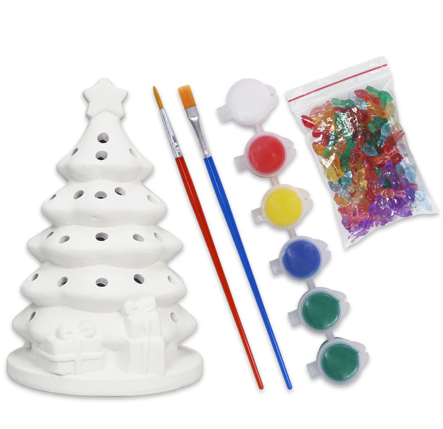 Ceramic Christmas tree decoration set with paintbrushes, paint, and decorative items on a white background