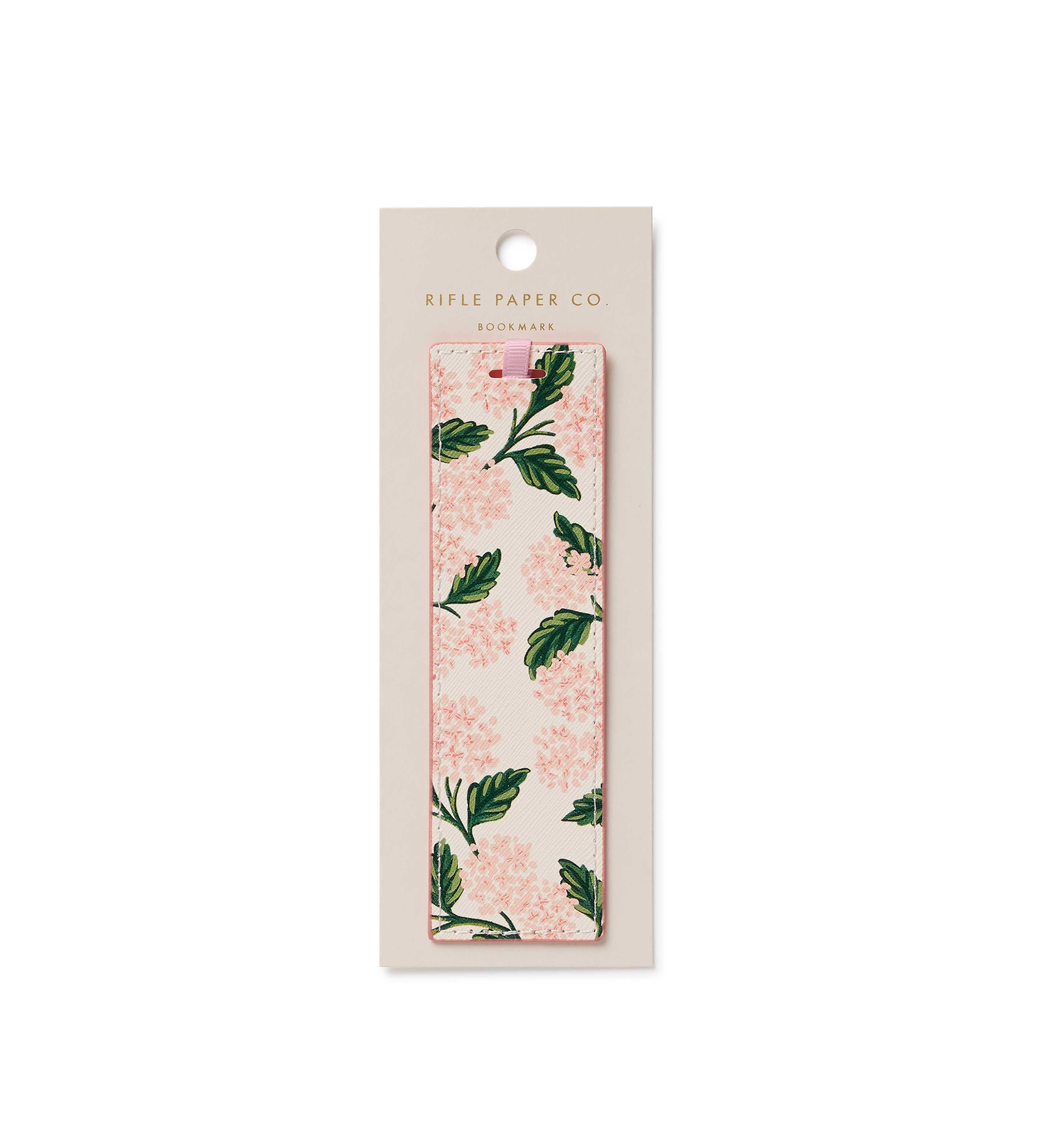 Floral and leaf patterned product in a Rifle Paper Co. packaging on a white background