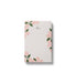 Notebook with floral design on a white background