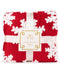Folded red and white floral throw blanket with a visible brand label on a white background