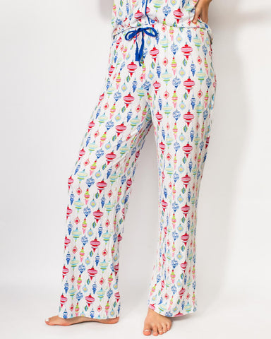 Colorful patterned pajama pants on a white background