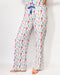 Colorful patterned pajama pants on a white background