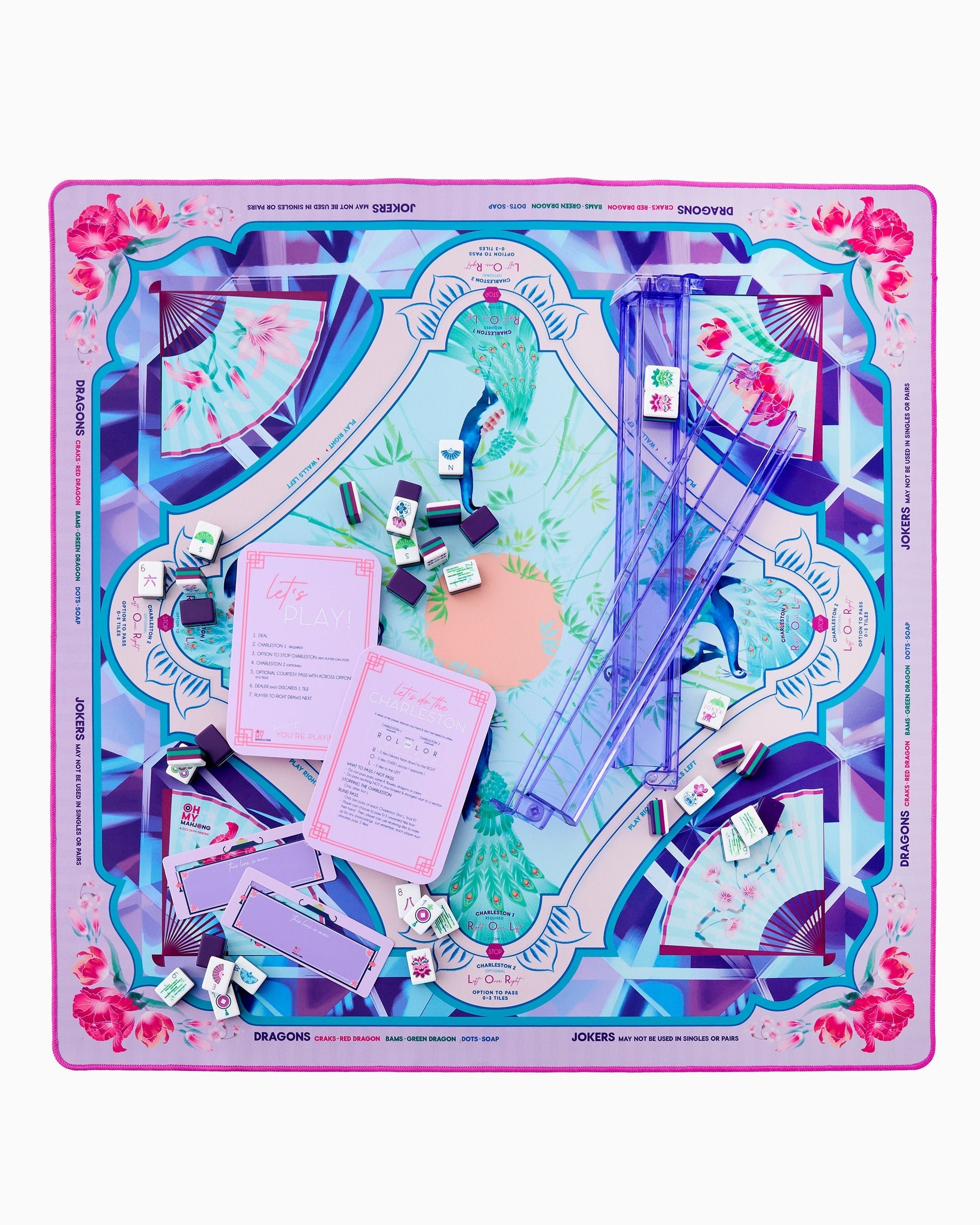 Colorful board game set with various pieces on a white background