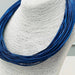 Blue Luster Leatherette Strand Necklace