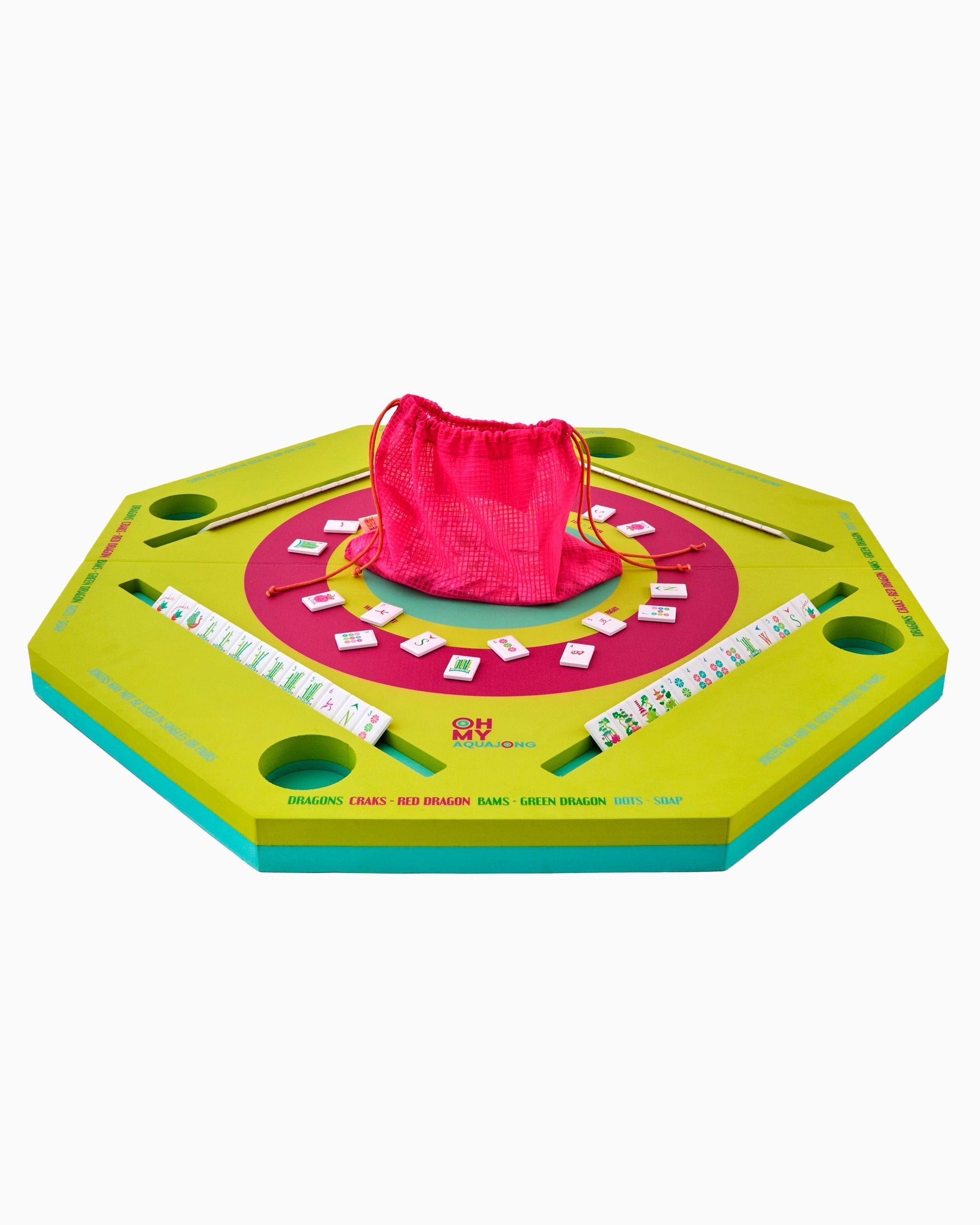 Colorful board game with a pink drawstring bag on a white background