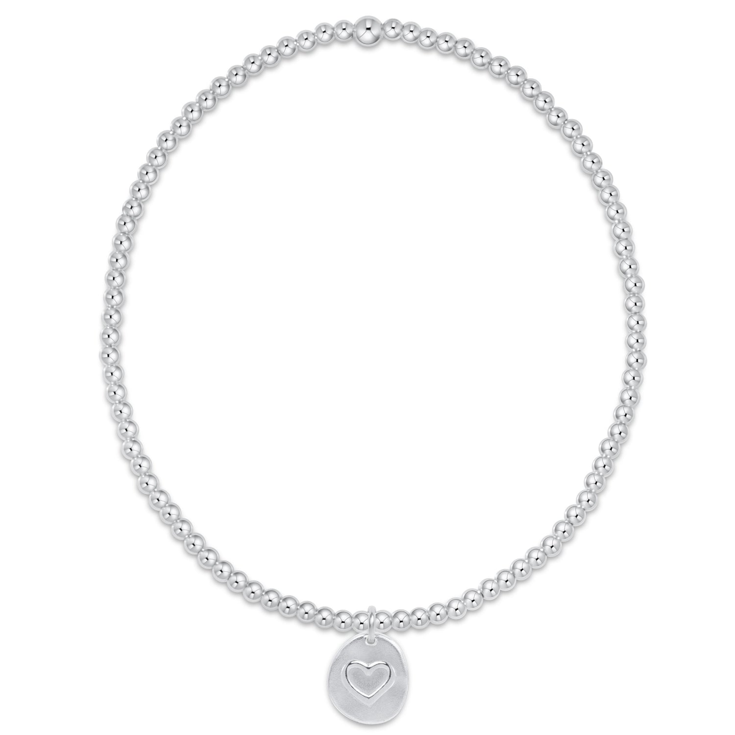 Silver beaded bracelet with a heart charm on a white background