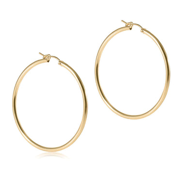 A pair of 14kt gold-filled smooth hoop earrings with notch clasp.