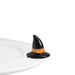 A ceramic Nora Fleming Witchful Thinking Mini figurine, resembling a black witch's hat with an orange band, placed on a white surface.